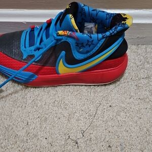 Nike Kids Sneakers in Red, Blue, and Yellow